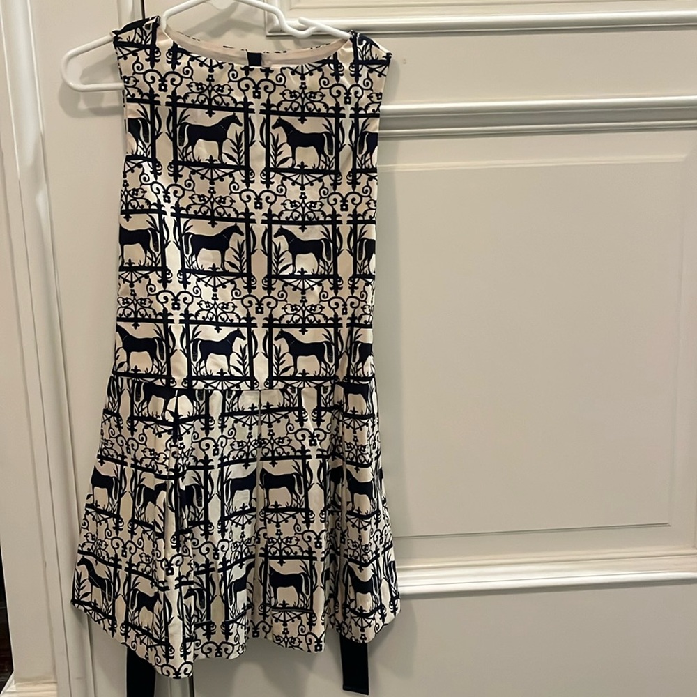 Navy and white dress with horses and a bow